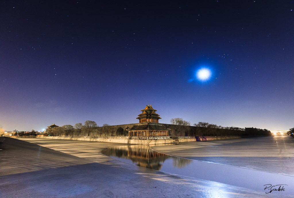 Moon shining over the north west corner of the Forbidden City in Beijing. 16.02.12 Time: 05:49