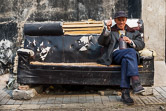 An old sofa used as a bench in a hutong. Beijing. 09.03.08