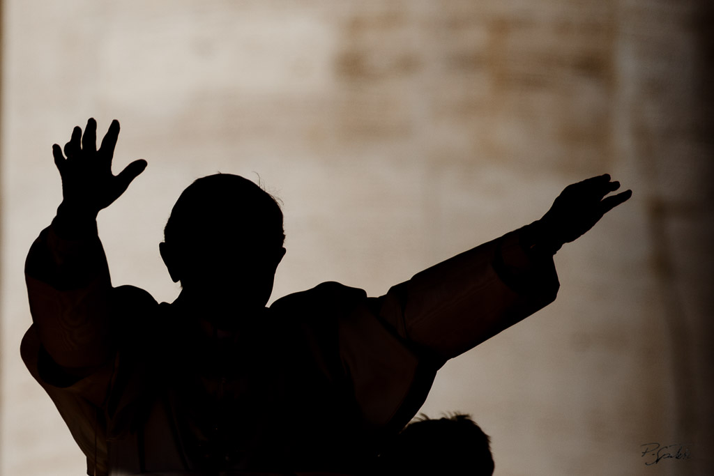 Pope Benedict XVI greets the faithful as he arrives to his weekly audience in St. Peter's Square. Vatican City, October 27, 2010.