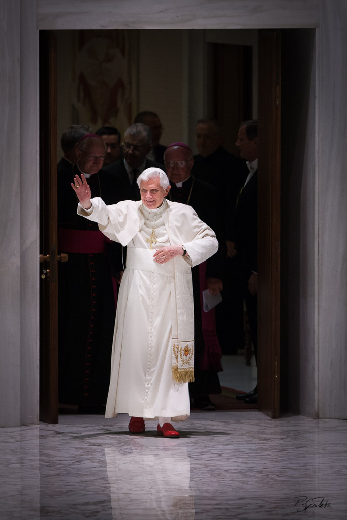 Pope Benedict XVI waves as he arrives to lead the weekly general audience in the Paul VI Hall at the Vatican September 15, 2010