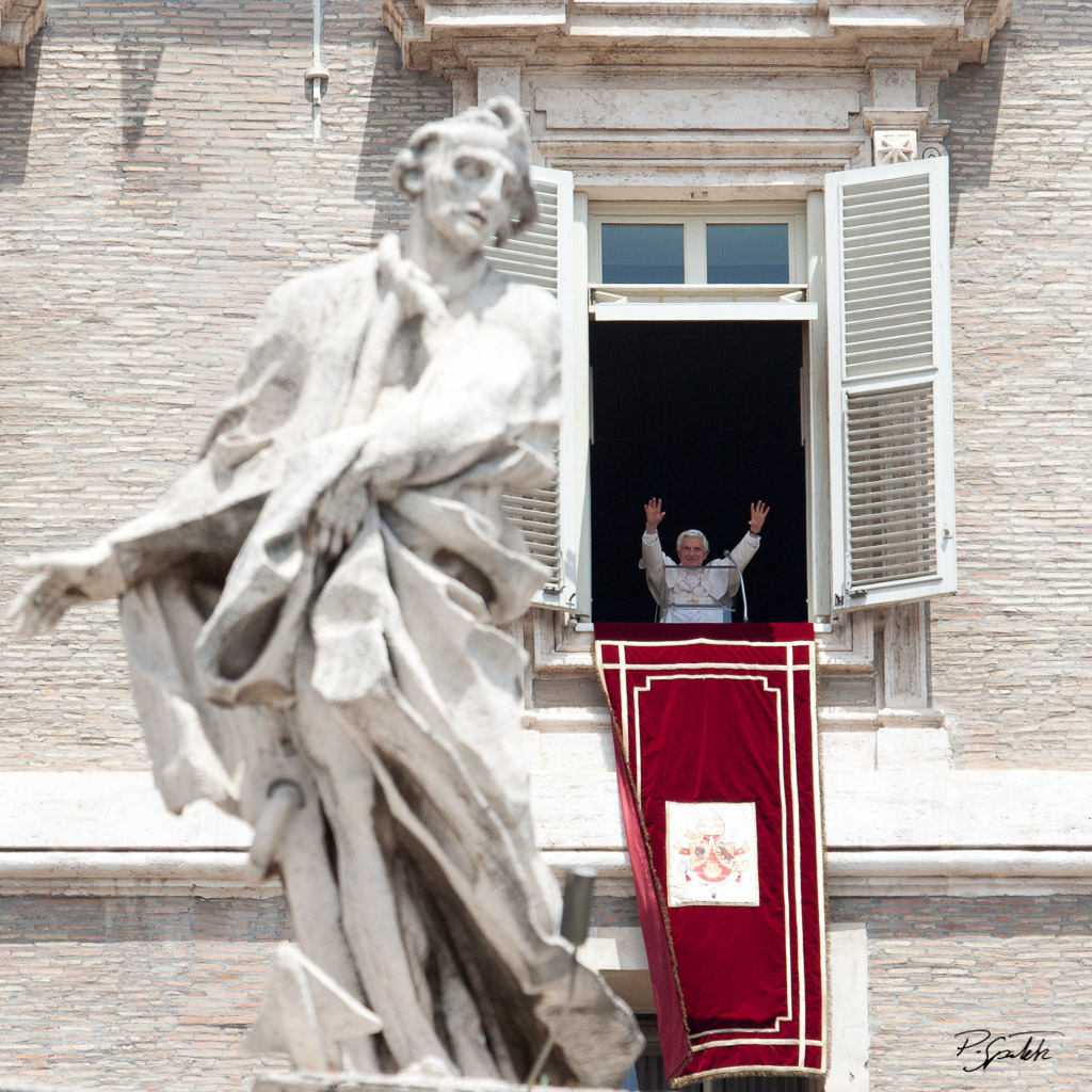 Pope Benedict XVI greets the faithful from his window in vatican palace at the end of the angelus in st. Peter square. Vatican City, June 13, 2010.