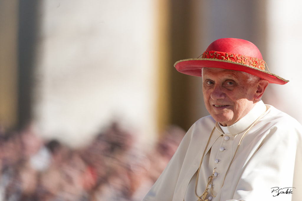 Pope Benedict XVI waves to the faithful gathered in St. Peter's square as he arrives to the weekly audience. Vatican City, October 6, 2010