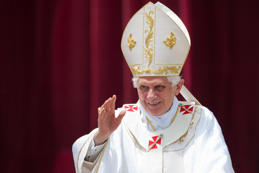 Pope Benedict XVI waves to the faithful after celebrating a mass in St. Peter's square with 10000 priests marking the end of the Roman Catholic Church's Year for Priests. Vatican City, June 11, 2010.