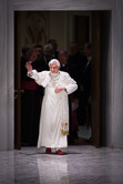 Pope Benedict XVI waves as he arrives to lead the weekly general audience in the Paul VI Hall at the Vatican September 15, 2010